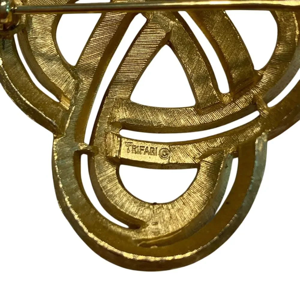 Vintage Crown Trifari brooch textured classic goldtone infinity trefoil knot